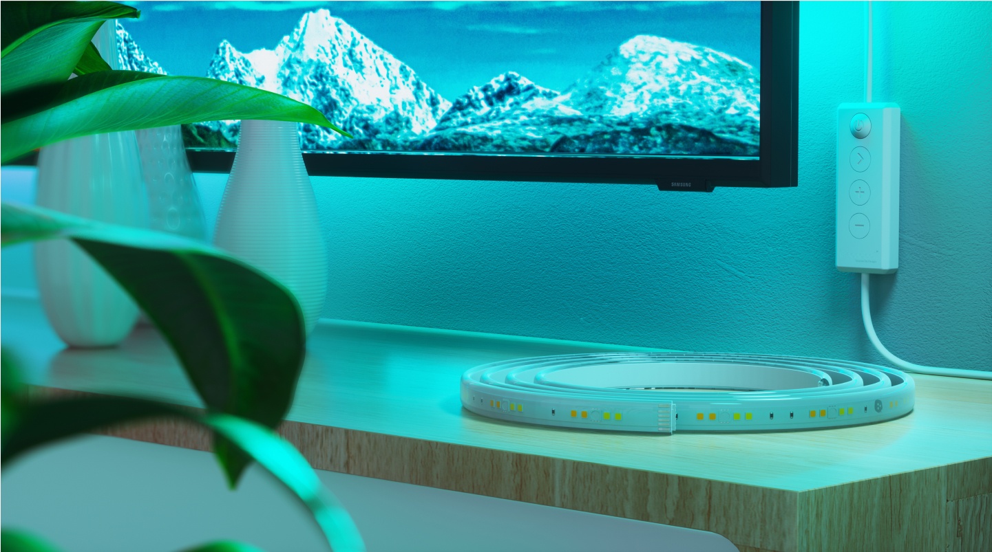 Office bedroom setup with Nanoleaf Lines RGB lights mounted above the desk and monitor. The perfect gaming lights for your PC battlestation.