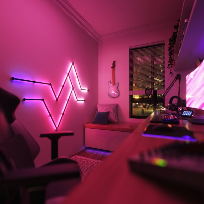 Office bedroom setup with Nanoleaf Lines RGB lights mounted above the desk and monitor. The perfect gaming lights for your PC battlestation.