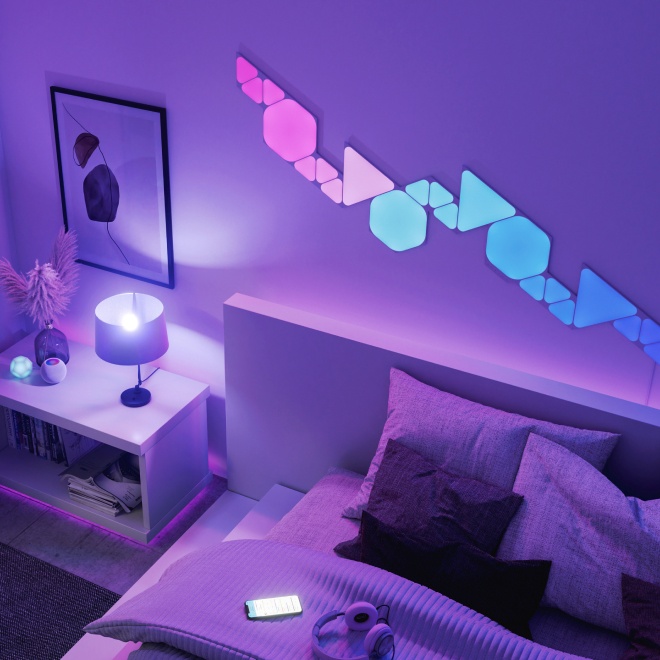 Office bedroom setup with Nanoleaf Lines RGB lights mounted above the desk and monitor. The perfect gaming lights for your PC battlestation.