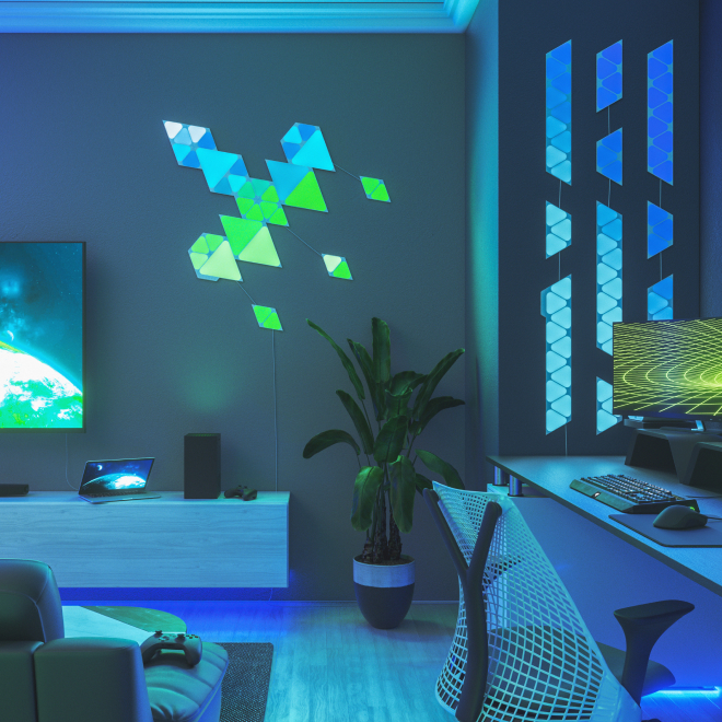 Office bedroom setup with Nanoleaf Lines RGB lights mounted above the desk and monitor. The perfect gaming lights for your PC battlestation.
